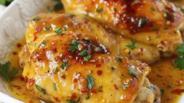 Juicy baked honey mustard chicken glazed with a golden sweet and tangy sauce, served fresh from the oven.