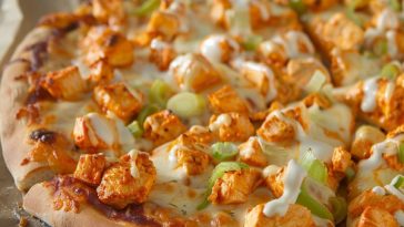 Buffalo-style chicken pizza topped with spicy chicken, melted cheese, and a crispy crust.