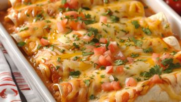 Soft flour tortilla chicken enchiladas baked with melted cheese and rich sauce.