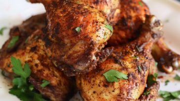Juicy pellet grill Cajun dry-brined chicken with crispy golden skin, coated in bold Cajun spices and cooked to perfection on a wood pellet grill.