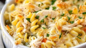 Creamy chicken noodle casserole baked with tender noodles and golden topping.