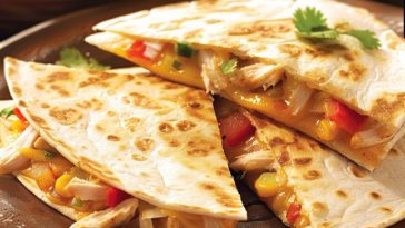 Crispy chicken quesadillas filled with seasoned chicken and melted cheese.
