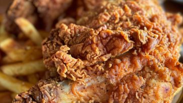 Crispy chicken fried chicken topped with creamy gravy, golden and juicy.