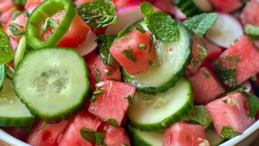 Fresh watermelon and cucumber salad with a light, zesty dressing.