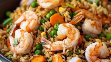 Shrimp fried rice with vegetables and eggs, savory and fluffy.