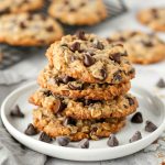 Chewy oatmeal cookies loaded with chocolate chips, golden on the edges and soft in the center.