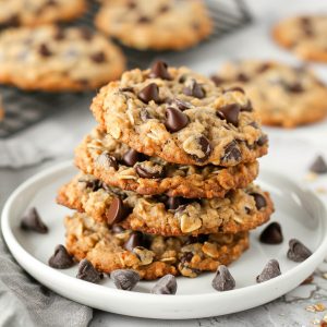 Chewy oatmeal cookies loaded with chocolate chips, golden on the edges and soft in the center.