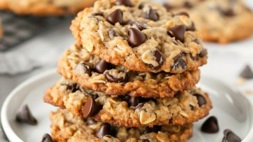 Chewy oatmeal cookies loaded with chocolate chips, golden on the edges and soft in the center.