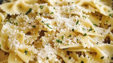 Creamy garlic Parmesan pasta served in a bowl with fresh parsley