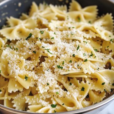 Creamy garlic Parmesan pasta served in a bowl with fresh parsley