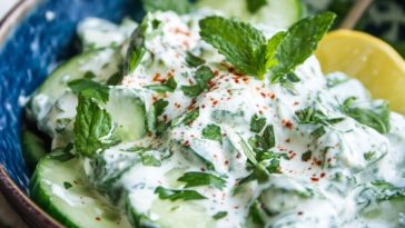 Creamy cucumber salad with lemon yogurt dressing served in a bowl