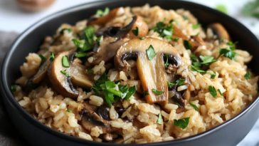 One pot mushroom rice with garlic ranch seasoning served in a rustic skillet.