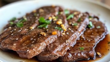 Beef steak marinated with herbs and spices on a plate