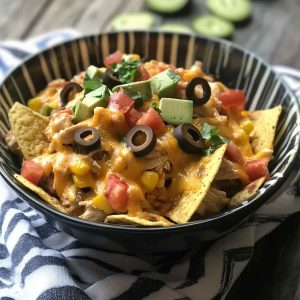Make these Instant Pot Chicken Nachos—cheesy, zesty, and perfect for game day or weeknight cravings!