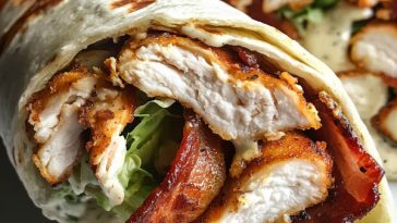 "Crispy chicken bacon ranch wrap filled with crunchy chicken tenders, smoky bacon, fresh lettuce, and creamy ranch dressing."
