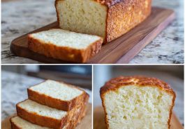 Sliced zero carb yogurt bread on a wooden board, surrounded by fresh herbs and a bowl of Greek yogurt.