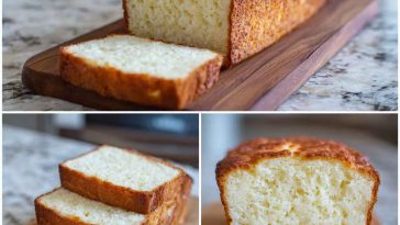 Sliced zero carb yogurt bread on a wooden board, surrounded by fresh herbs and a bowl of Greek yogurt.