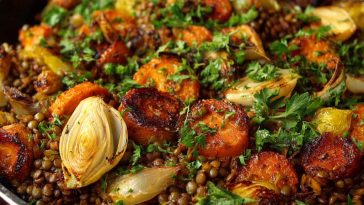 Herbed lentil rice with roasted veggies, featuring fluffy rice, tender lentils, and colorful roasted vegetables like carrots, zucchini, and bell peppers, garnished with fresh herbs and served in a bowl.