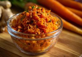 Golden smashed carrots roasted until crispy, garnished with fresh herbs and a drizzle of tahini or yogurt sauce.