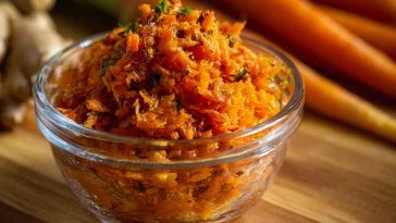 Golden smashed carrots roasted until crispy, garnished with fresh herbs and a drizzle of tahini or yogurt sauce.