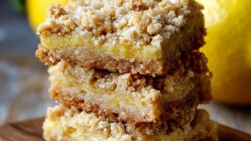 Golden lemon oatmeal crumble bars with a zesty lemon filling and buttery oat topping.