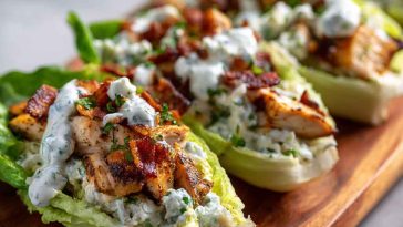 Chicken bacon ranch lettuce boats filled with juicy chicken, crispy bacon, shredded cheese, and creamy ranch dressing.