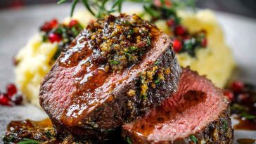 Juicy million dollar tenderloin roasted to perfection, sliced and served with herbs and a rich sauce.