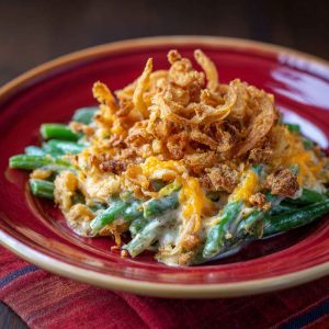 Cheddar Bay green bean casserole baked with tender green beans, creamy sauce, melted cheddar, and buttery biscuit topping.