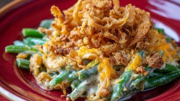 Cheddar Bay green bean casserole baked with tender green beans, creamy sauce, melted cheddar, and buttery biscuit topping.