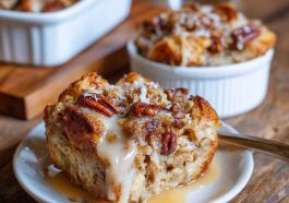 Toasted coconut pecan bread pudding baked golden brown in a casserole dish