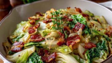 Cooked cabbage with bacon and herbs