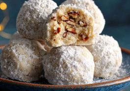 Buttery pecan snowball cookies coated in powdered sugar, with a rich, nutty flavor and melt-in-your-mouth texture.