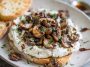 Whipped ricotta topped with balsamic marinated mushrooms, fresh herbs, and a drizzle of olive oil served on crusty bread.