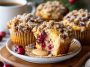 Cranberry coffee cake muffins topped with golden streusel crumble