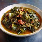 Gumbo collard greens simmered with smoked sausage, onions, peppers, and spices in a savory Southern-style broth.