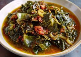 Gumbo collard greens simmered with smoked sausage, onions, peppers, and spices in a savory Southern-style broth.