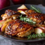 Sticky apple cider chicken served with golden crisp topping, sweet-savory glaze, and cozy fall flavors.