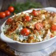 Golden baked chicken tzatziki casserole with fresh herbs and melted cheese.