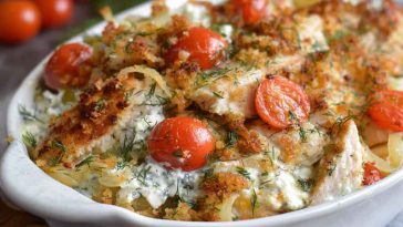 Golden baked chicken tzatziki casserole with fresh herbs and melted cheese.