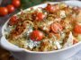 Golden baked chicken tzatziki casserole with fresh herbs and melted cheese.