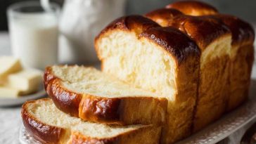 Soft condensed milk bread with golden crust, fluffy texture, and a lightly sweet flavor perfect for breakfast or snacks.