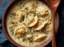 Creamy dill pierogi soup with tender dumplings, fresh dill, and a rich broth served in a cozy bowl.