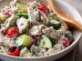 "Fresh tzatziki chicken salad served in a bowl with cucumbers, herbs, and creamy Greek yogurt dressing."