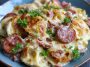 “A hearty crockpot pierogi casserole with kielbasa, melted cheese, and golden onions served in a rustic dish.”