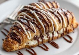 Easy chocolate cream cheese Danish with flaky pastry layers, rich chocolate filling, and creamy cheese center.