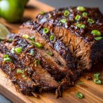 Slow-cooked beef brisket sliced and served with rich gravy.