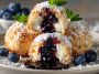 Golden blueberry pie bombs filled with sweet blueberry filling, topped with sugar glaze, perfect dessert bites.