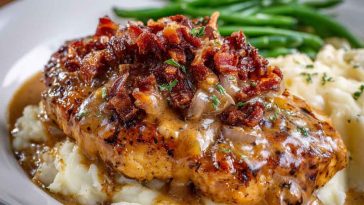 Texas Roadhouse smothered chicken topped with sautéed onions, mushrooms, melted cheese, and savory gravy.
