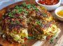 Easy crispy cabbage burger bake with layers of seasoned ground beef, shredded cabbage, melted cheese, and golden crispy topping baked in a casserole dish.