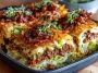Easy crispy cabbage burger bake in a casserole dish, layered with seasoned ground beef, shredded cabbage, melted cheese, and savory spices baked golden brown.